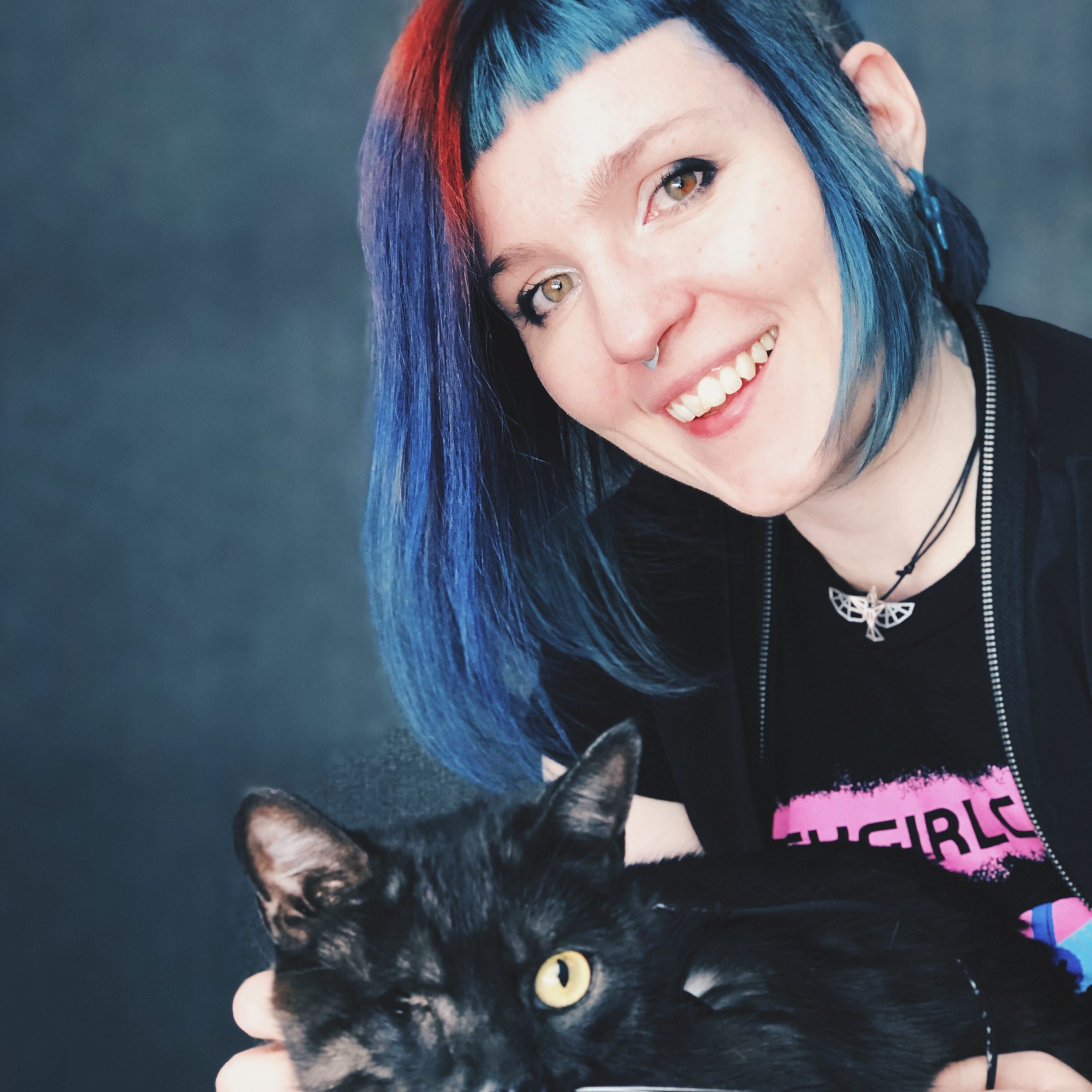Cherry Thompson and their Cat Odin